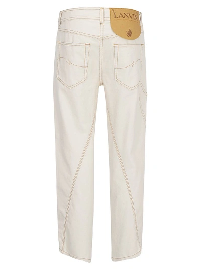 Shop Lanvin Asymmetric Hem Detail Jeans In Beige