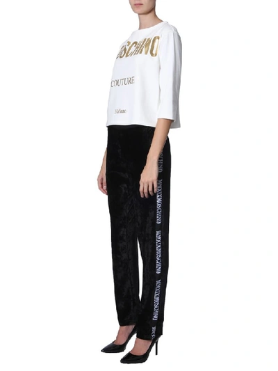 Shop Moschino Logo Band Track Trousers In Black