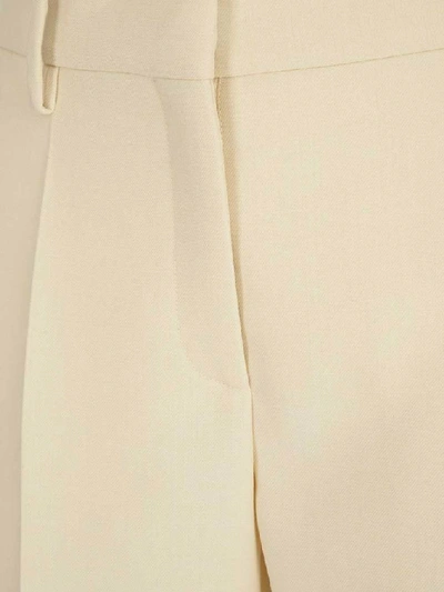 Shop Valentino Palazzo Trousers In White