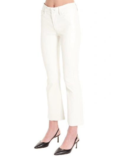 Shop Frame Cropped Flared Jeans In White