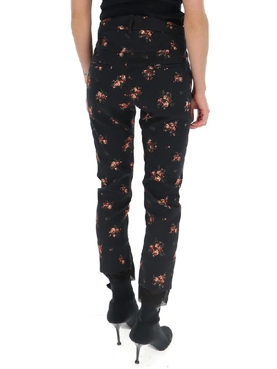 Shop Ann Demeulemeester Floral Print Pants In Black/red