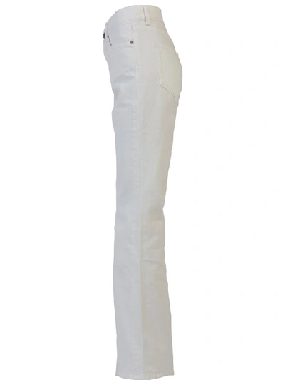 Shop Saint Laurent Stone Washed Jeans In White