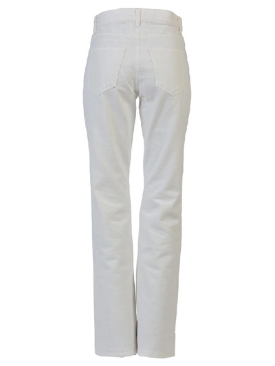 Shop Saint Laurent Stone Washed Jeans In White