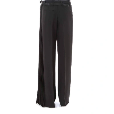 Shop Prada Pleated Detail Trousers In Black