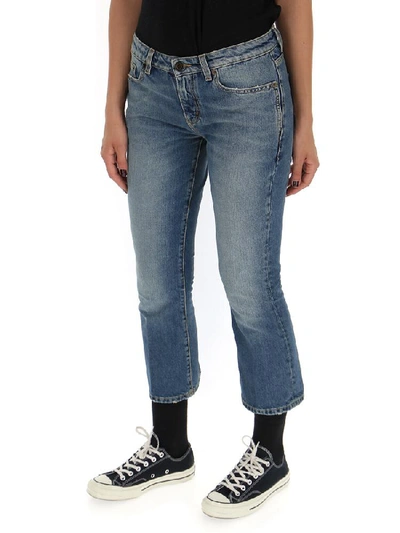 Shop Saint Laurent Cropped Low Waist Jeans In Blue