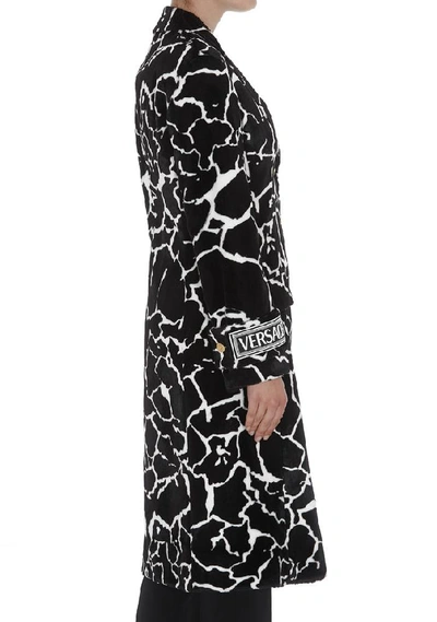 Shop Versace Marble Print Coat In Black