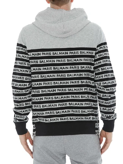Shop Balmain All Over Logo Striped Hoodie In Grey