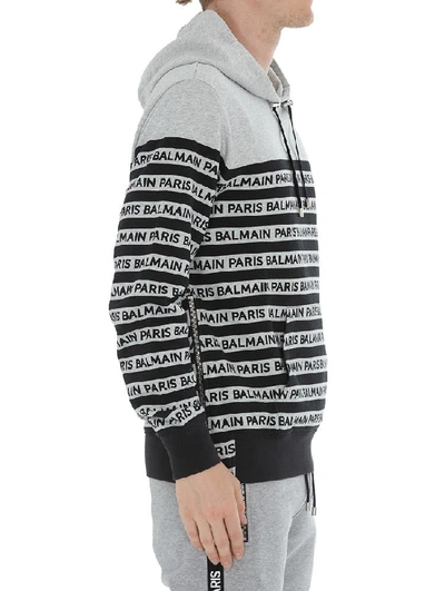 Shop Balmain All Over Logo Striped Hoodie In Grey