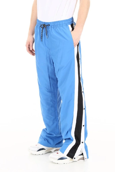 Shop Burberry Stripe Jersey Trackpants In Blue