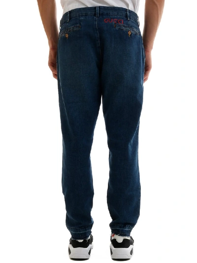 Shop Gucci Classic Logo Embroidered Tapered Jeans In Blue