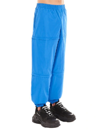 Shop Balenciaga Zipped Logo Tracksuit Pants In Blue