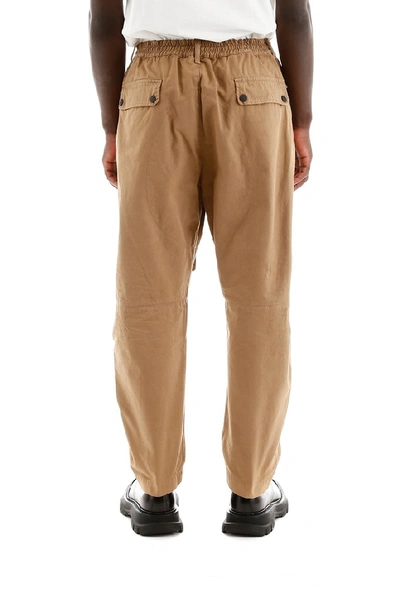 Shop Dsquared2 Printed Pocket Tapered Cargo Pants In Beige