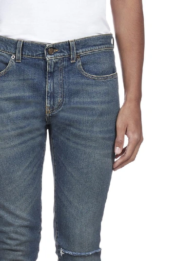 Shop Saint Laurent Ripped Skinny Jeans In Blue