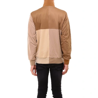 Shop Burberry Zipped Logo Jacket In Brown