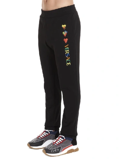 Shop Versace Heart Embroidered Sweatpants In Black