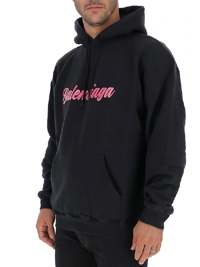 Shop Balenciaga Logo Printed Hoodie In Washed Black/pink