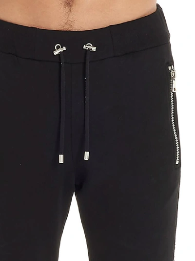 Shop Balmain Logo Trim Sweatpants In Black