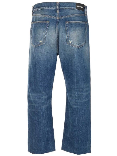 Shop Balenciaga Cropped Stonewashed Jeans In Blue