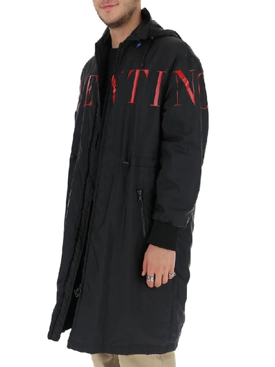 Shop Valentino Logo Print Hooded Raincoat In Nerorosso