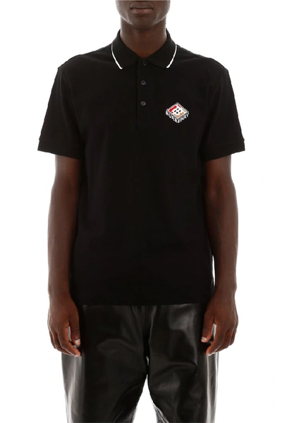 Shop Burberry Logo Embroidered Polo Shirt In Black
