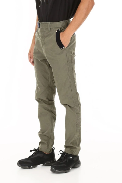 Shop Sacai Belted Trousers In Green