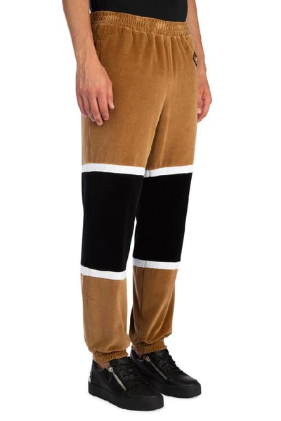 Shop Burberry Logo Striped Sweatpants In Brown