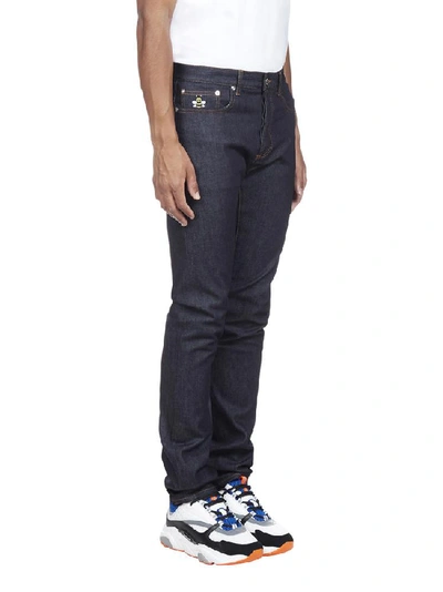 Shop Dior Homme X Kaws Bee Logo Jeans In Blue