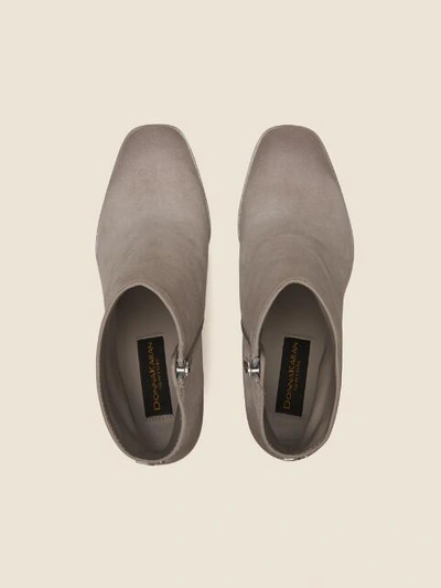 Shop Donna Karan Women's Dallas Wedge Ankle Bootie - In Light Grey