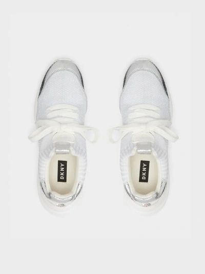 Shop Donna Karan Pamela Metallic Sneaker In White/silver
