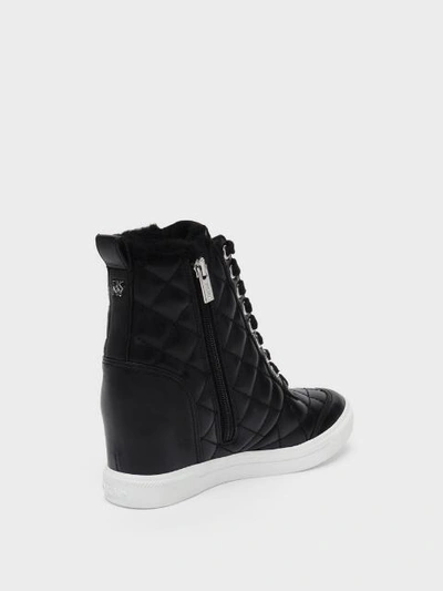 Shop Donna Karan Cira Wedge Sneaker In Black