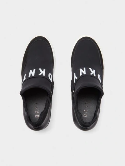 Shop Donna Karan Dkny Women's Cosmos Wedge Slip-on Sneaker - In Black