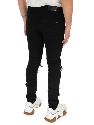 Shop Amiri Mx1 Distressed Jeans In Black
