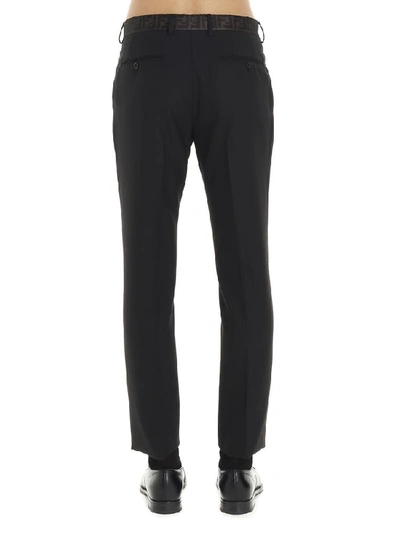 Shop Fendi Logo Tape Waistband Tailored Pants In Black