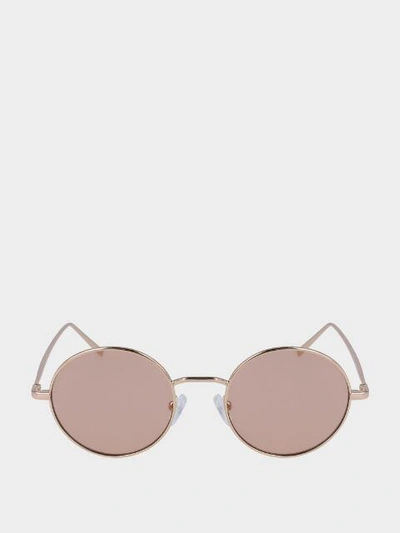 Shop Donna Karan Round Sunglasses With Tonal Lenses In Rose Gold / Blush