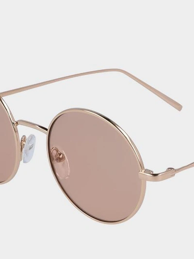 Shop Donna Karan Round Sunglasses With Tonal Lenses In Rose Gold / Blush