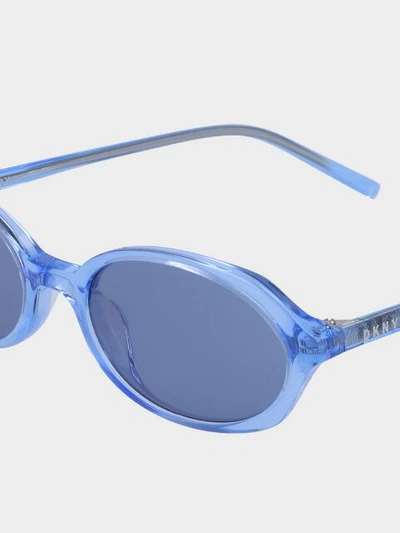 Shop Donna Karan Oval Sunglasses With Tonal Lenses In Sky Blue