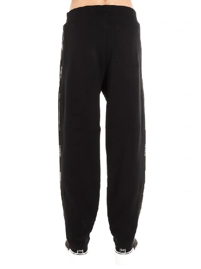 Shop Givenchy Logo Trim Sweatpants In Black