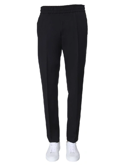 Shop Givenchy Relaxed Fit Trousers In Black