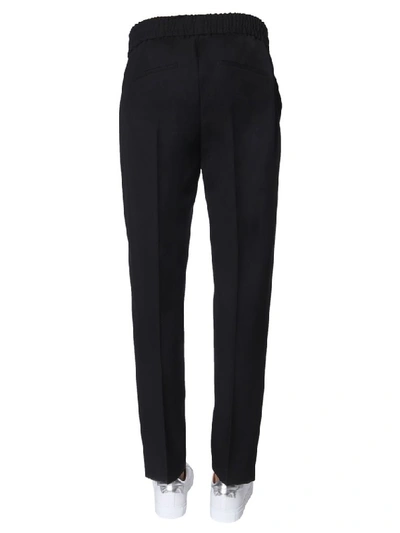 Shop Givenchy Relaxed Fit Trousers In Black