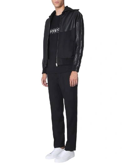 Shop Givenchy Relaxed Fit Trousers In Black