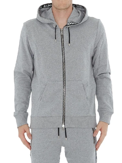 Shop Balmain Logo Band Zipped Hoodie In Grey