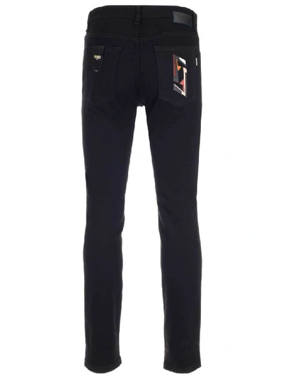 Shop Fendi Ff Futuristic Patch Jeans In Black