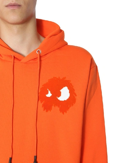 Shop Mcq By Alexander Mcqueen Mcq Alexander Mcqueen Monster Print Hoodie In Orange