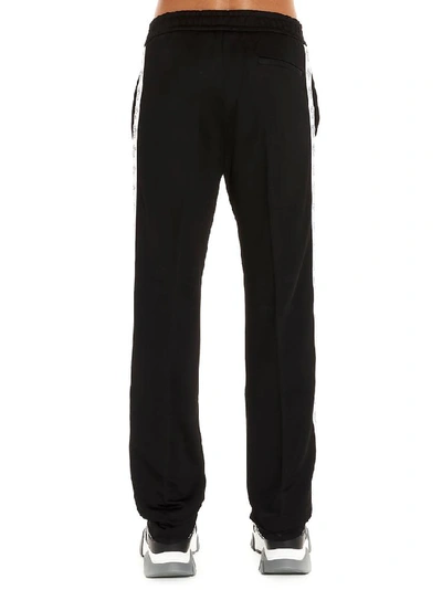 Shop Versace Logo Print Trim Sweatpants In Black