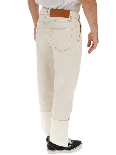 Shop Loewe Contrast Stitch Jeans In White