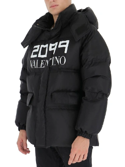 Shop Valentino Logo Printed Oversize Down Jacket In Black