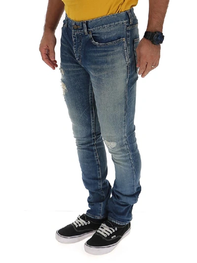 Shop Saint Laurent Distressed Skinny Jeans In Blue