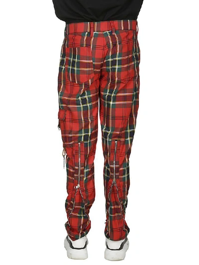 Shop Alexander Mcqueen Checked Pants In Red