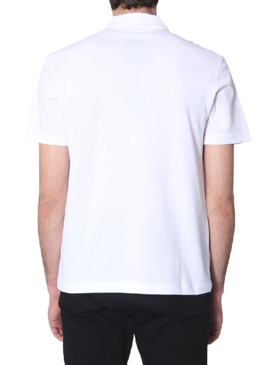 Shop Versace Logo Embroidered Polo Shirt In White