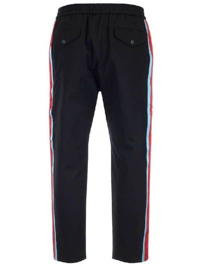 Shop Gucci Contrast Side Band Trousers In Black